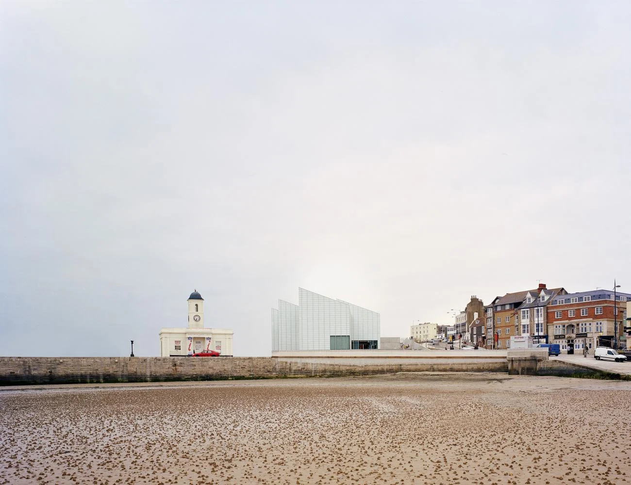 The Turner Contemporary art gallery in Margate, designed by David Chipperfield, seen from the sandy beach.