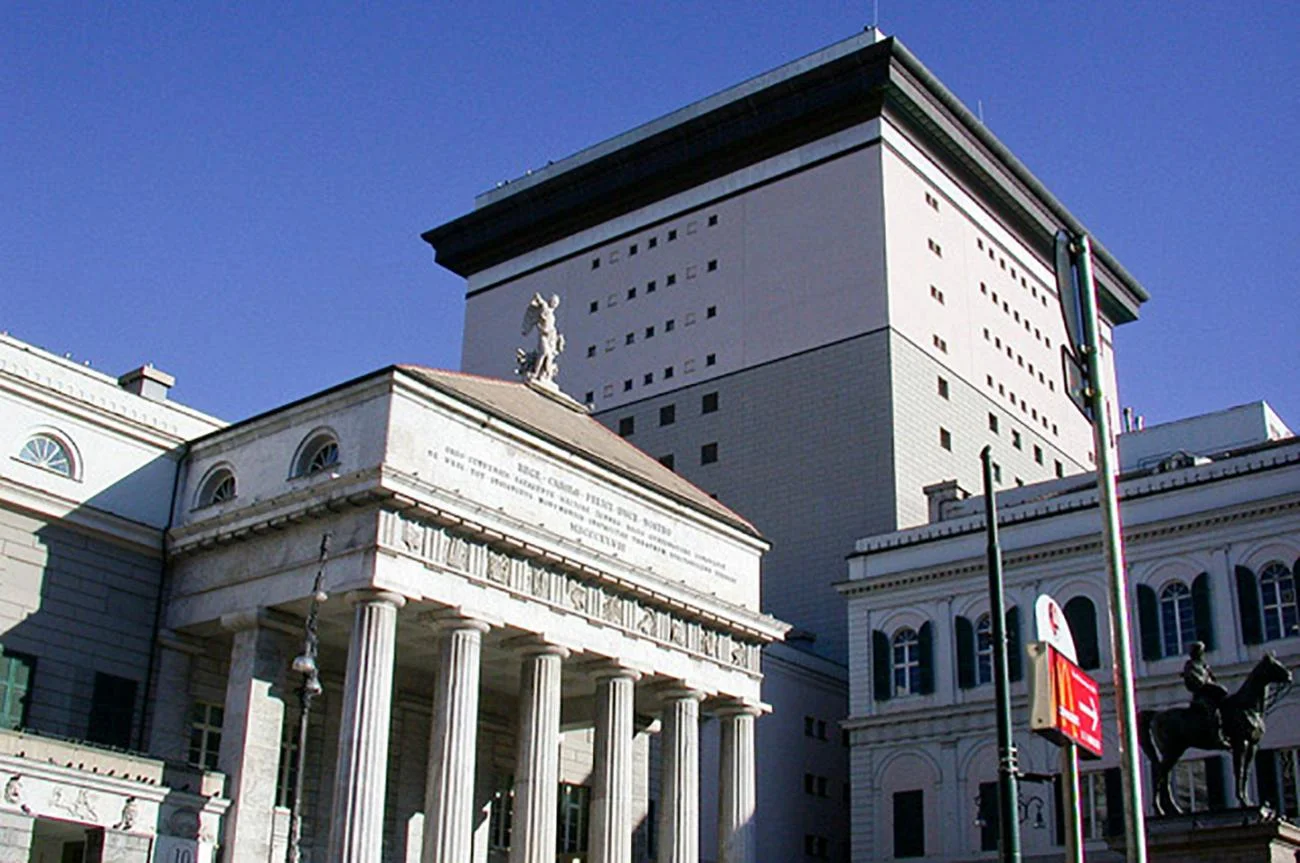 The Carlo Felice Theatre in Genoa by Aldo Rossi, showing the historic portico in front of a massive modern tower.