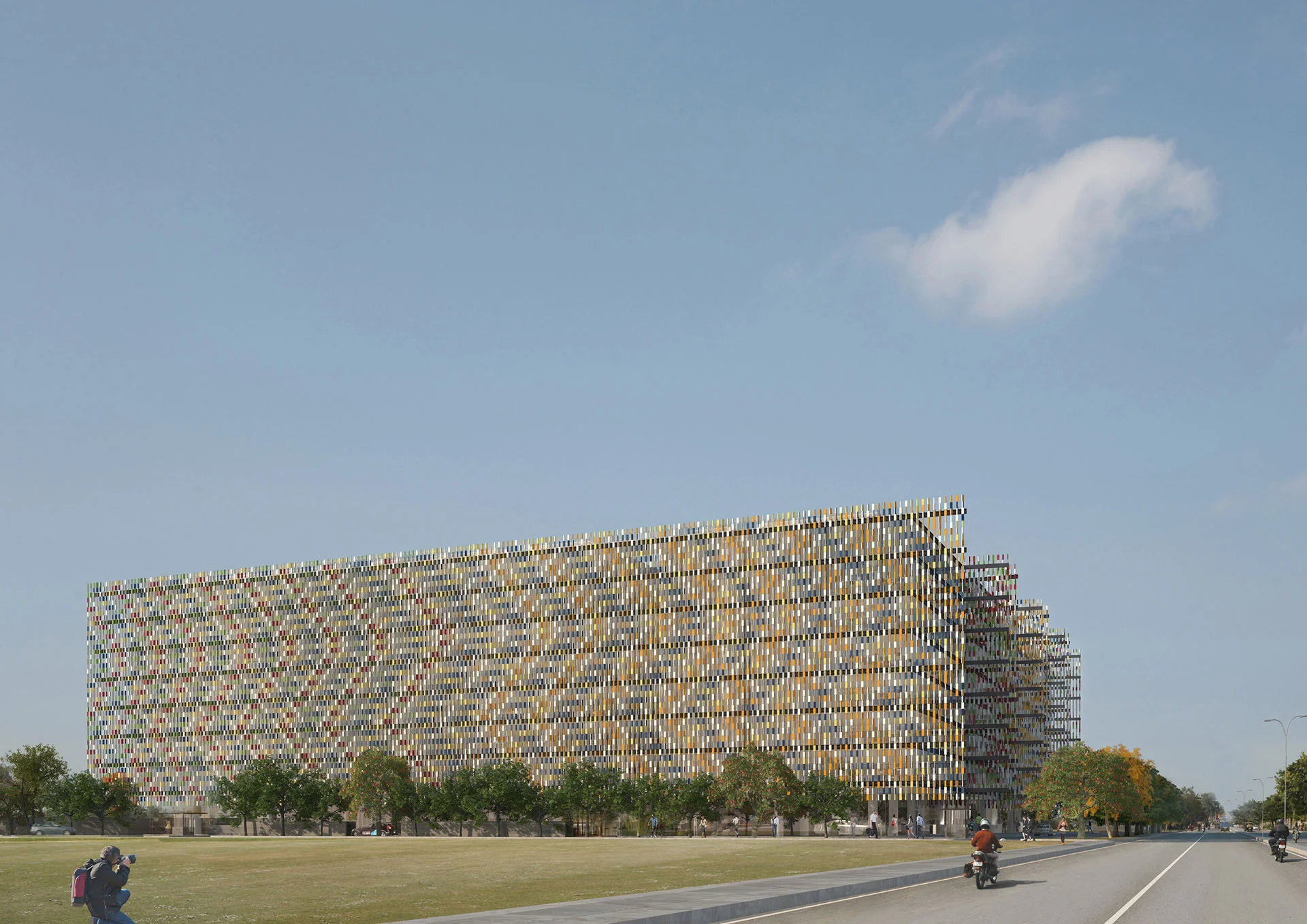 Exterior facade of Lehariya Jaipur by Obr Business Development showing a multi-story building wrapped in a colorful vertical louvre screen.