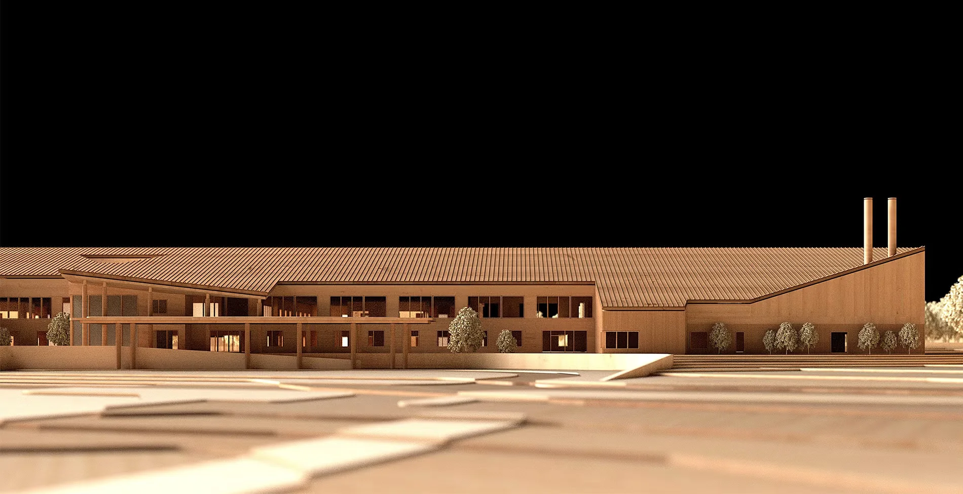 Physical architectural model of a long, single-story healthcare and residential complex with gabled roof lines and twin stacks by HDR.