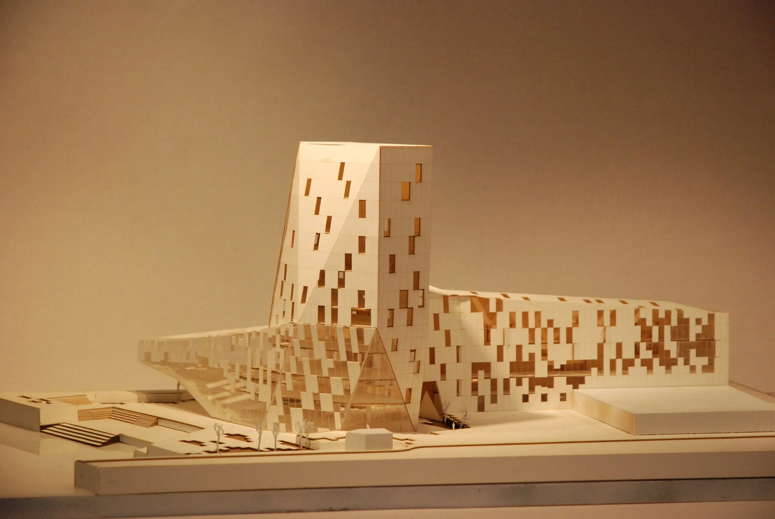 Physical architectural study model of a complex tower and sprawling podium by Ròhme Architects.