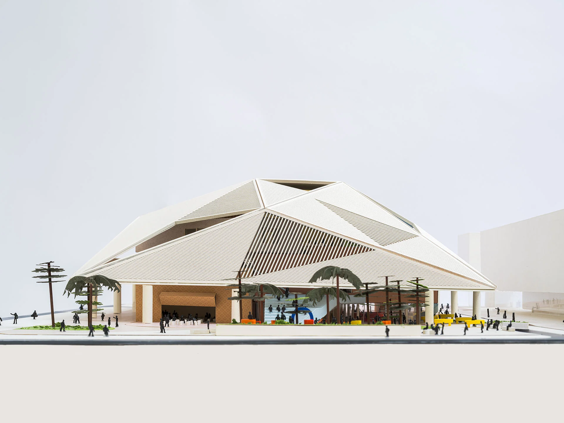 Physical architectural model of a pavilion with a faceted folded-plate roof by WORKac.