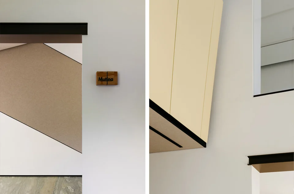 Interior detail composition showing minimalist white walls, black shadow gaps, and subtle geometric planes by ONOAA STUDIO.
