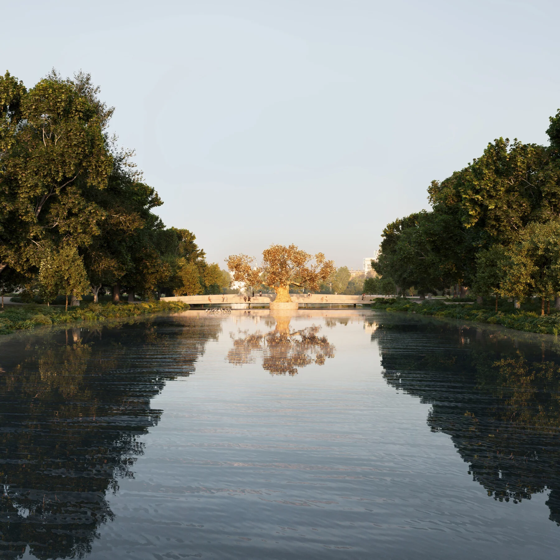 Symmetrical view down a calm reflecting canal framed by dense tree lines, terminating at a golden tree sculpture and pedestrian bridge by Jamie Fobert Architects.