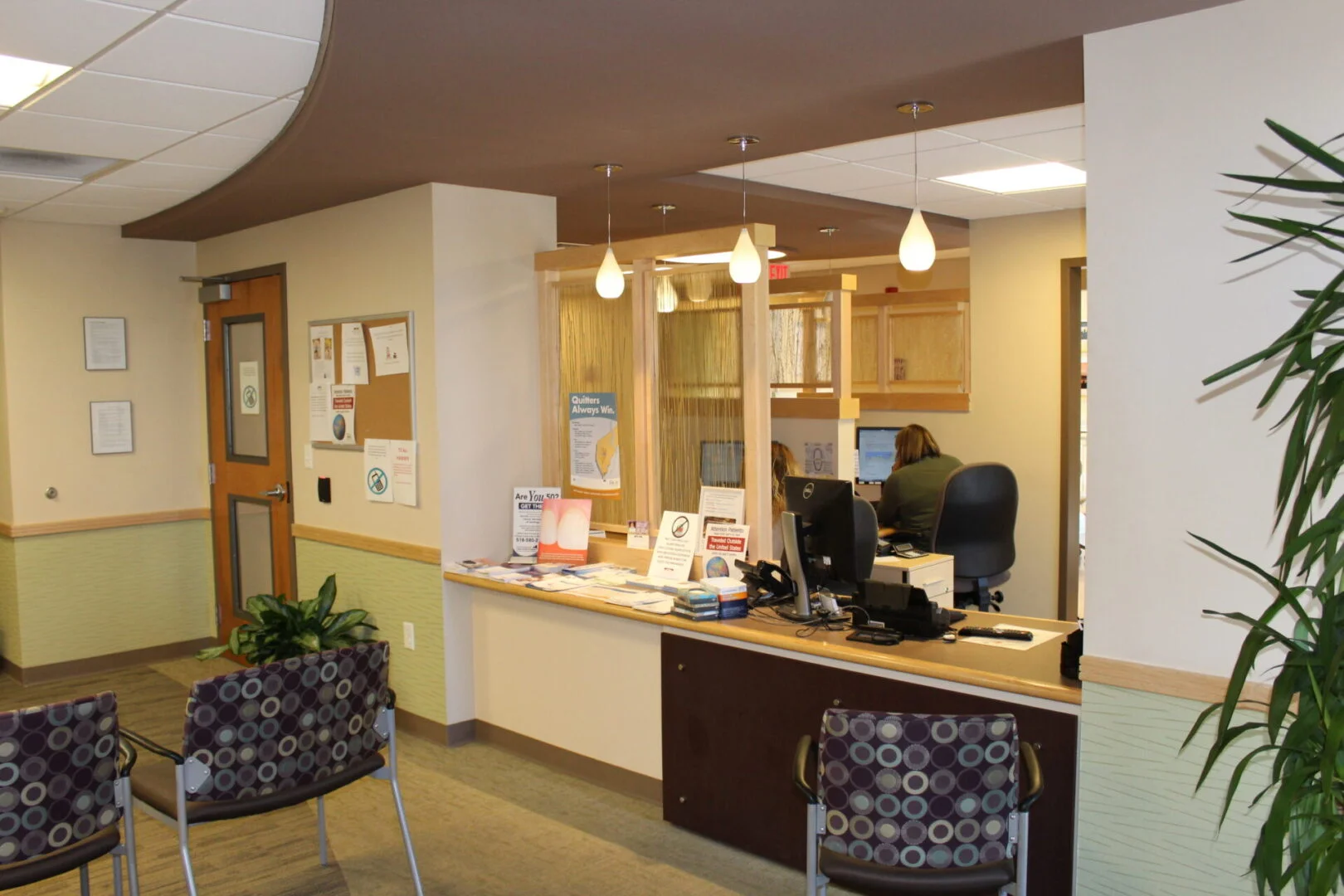 Interior waiting room and reception desk for Hamilton Dental by Architectural Collaborative LLC.