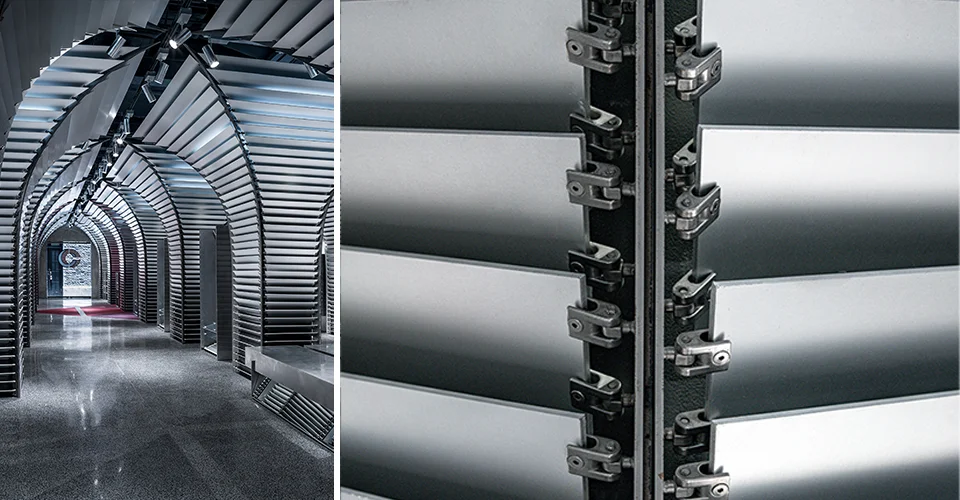 Interior vault corridor lined with operable metallic louvers and mechanical hinge details by dongqi Design.