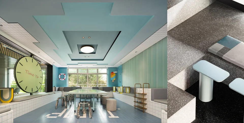 Interior view of a shared lounge space featuring teal stepped ceiling recesses, graphic floor tile, and built-in banquette seating.