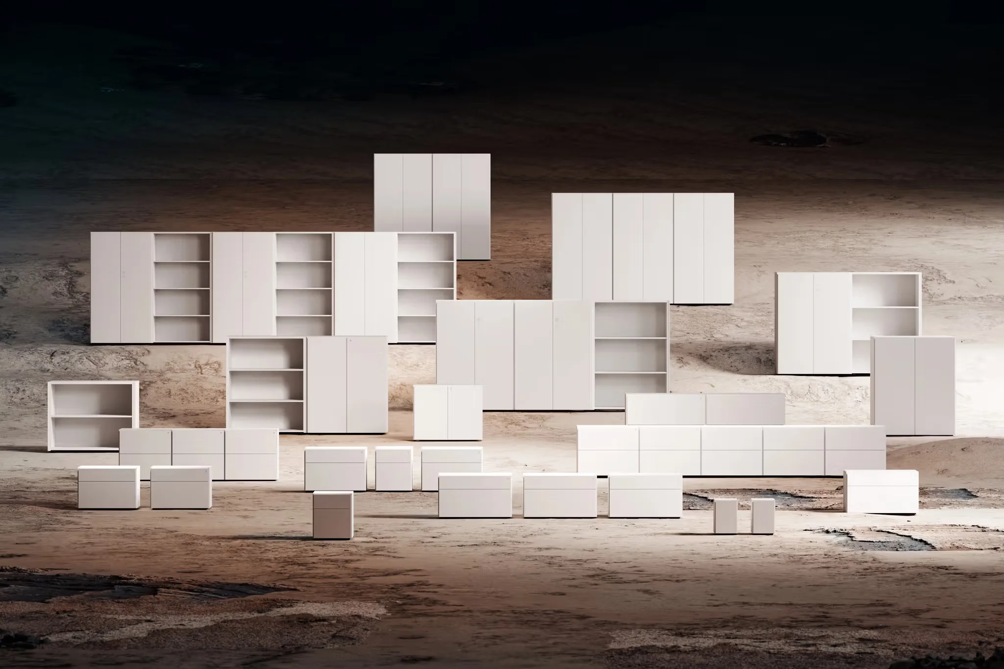 Modular white cabinetry system displayed across an uneven, rocky ground surface by Studio Klass.